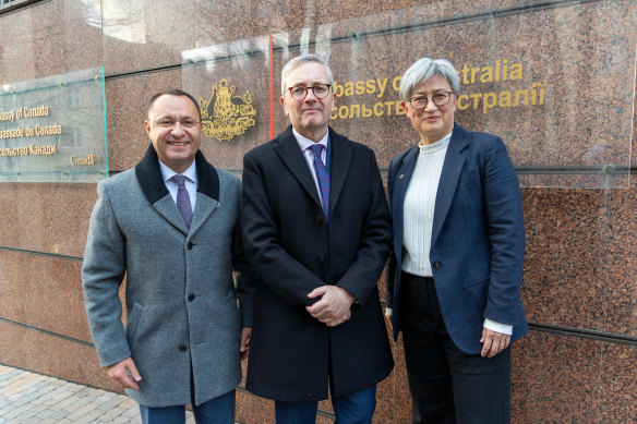 Australian Foreign Minister Penny Wong (centre) outside the Australian Embassy in Kyiv, with Australia’s ambassador Paul Lehmann and Ukraine’s ambassador Vasyl Myroshnychenko. 