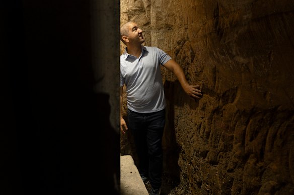 Tour guide Marc Cote of Lost and Buried tours explores a secret tunnel under the conservatorium. 