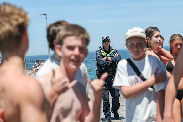 Young people at Mordialloc Beach on Thursday.