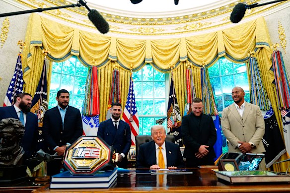 Trump meets UFC fighters in the Oval Office earlier this month.