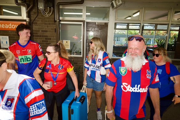 Newcastle fans at Broadmeadow Station start the journey to Sydney.