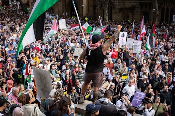Thousands gather at Town Hall to protest Israeli President Isaac Herzog’s visit to Sydney.