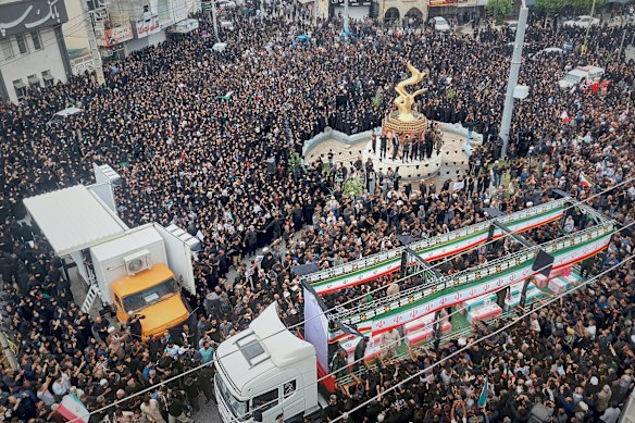 Thousands of mourners gathered for the funeral for those killed at the girls’ school.