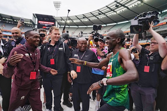 Kipchoge celebrates after the race.