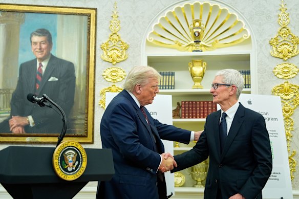 Donald Trump with Apple CEO Tim Cook in the Oval Office this year. 