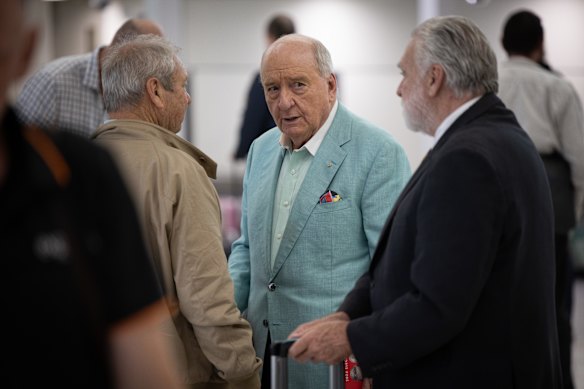 Alan Jones arrives at Sydney airport’s domestic terminal on Tuesday.