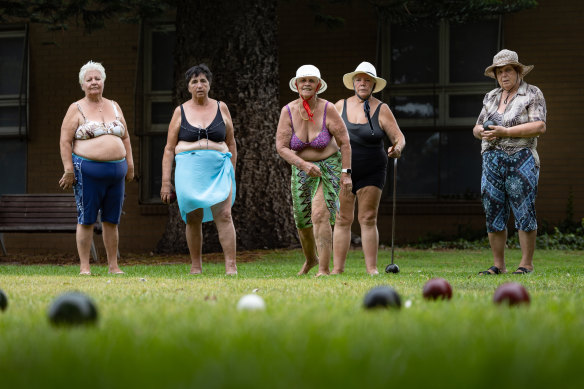 Women play bowls in Altona on a hot day exceeding 40 degrees in Melbourne.