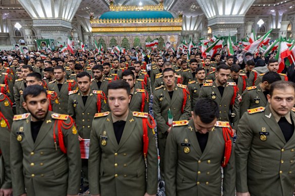 Military forces participate in the ceremony marking Khomeini’s entry into Iran at the shrine of Ayatollah Khomeini in south Tehran.
