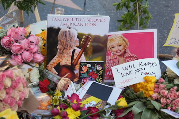 Flowers and tributes left for Dolly Parton on the Hollywood Walk of Fame in Los Angeles.