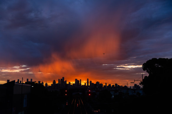 Dawn over Melbourne on Tuesday morning after another hot night.