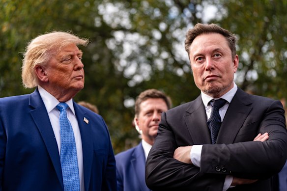 Donald Trump and Elon Musk pictured outside the White House in August.