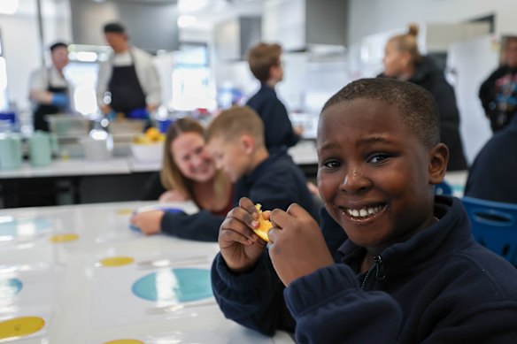 Toby enjoys a snack with fellow students at Melton Specialist School, which has been providing meals to some of its students, many of whom have intellectual disabilities and neurodiversity, Families are noticing their kids are eating foods they would have never touched as part of their routines at home. 
