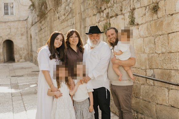 Reuven Morrison (centre) with his family on a recent trip.