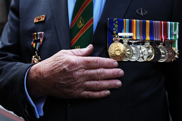 Rod White, a Vietnam veteran, waits to march in Sydney.