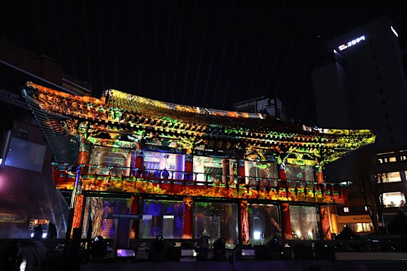 People gathered to celebrate at the annual bell-tolling ceremony at the Bosingak Pavilion in Seoul.