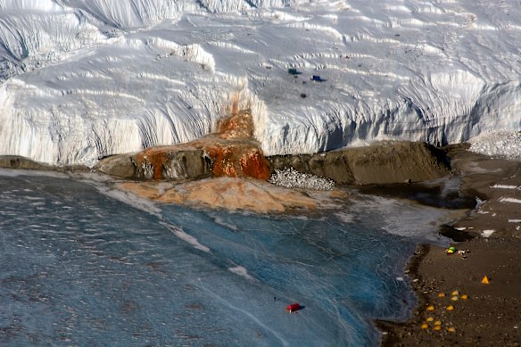 Blood Falls flowing from the tongue of Taylor Glacier onto the ice-covered surface of West Lake Bonney in the Taylor Valley in East Antarctica.