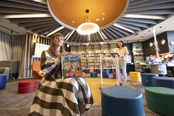 Wren O’Brien and Lily Zhang at Williams Landing’s small library, where staff have to leave the room so more children can join in “rhyme time”.