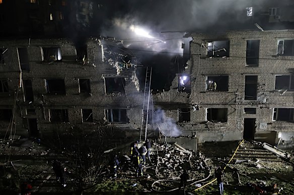 Rescue workers search the site of a building destroyed in a Russian strike in Zaporizhzhia, Ukraine, last week.