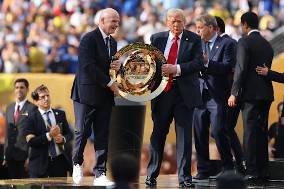 FIFA President Gianni Infantino and Donald Trump present the FIFA Club World Cup trophy to Chelsea last year.