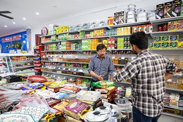 Inside the older shops along Merrylands old strip is Ali Sharifi. His business, which he has handed down to his son, Jahar Sharifi, has been operating from the same location for 20 years.