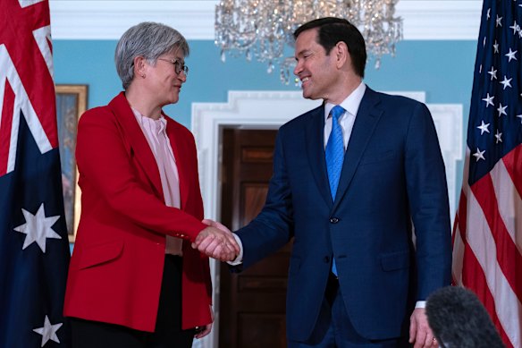 Foreign Minister Penny Wong and US Secretary of State Marco Rubio shake hands before a meeting at the State Department in Washington.