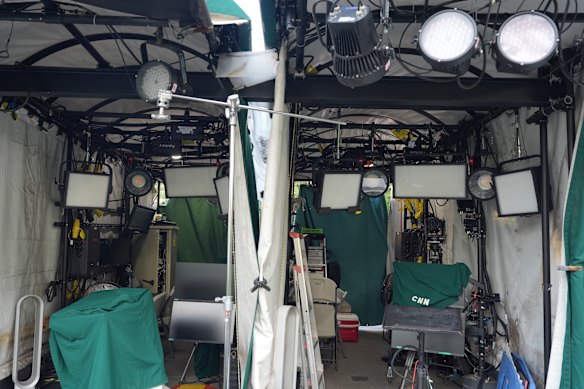 The covered television positions for CNN on the North Lawn of the White House.