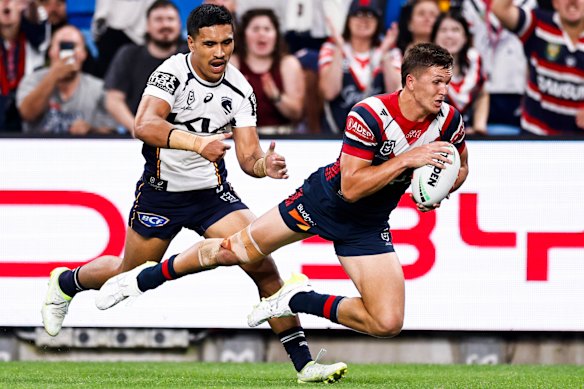 Deine Mariner chasing the Roosters’ Hugo Savala at Allianz Stadium on Saturday night.
