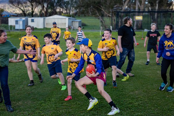 Harcourt’s under-12 side plays a scratch match against the parents.