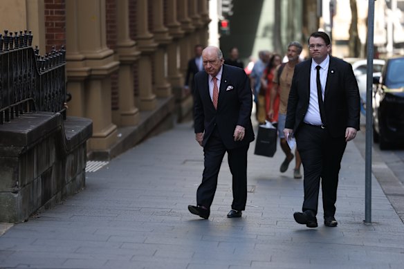 Alan Jones arrives ahead of the service.