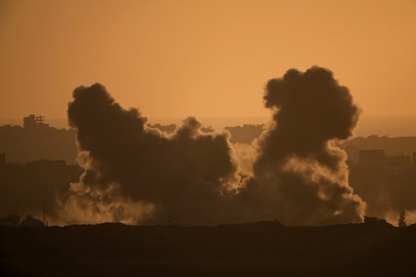 Smoke rises to the sky following an Israeli army bombardment in the northern Gaza Strip on Tuesday.