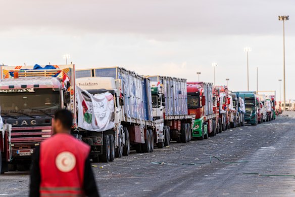 Trucks carrying aid wait at the border crossing for entry into the Gaza Strip on October 12, 2025 in Rafah, Egypt. 