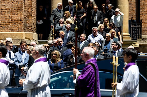 Mourners leave St James’ Church after the state funeral.