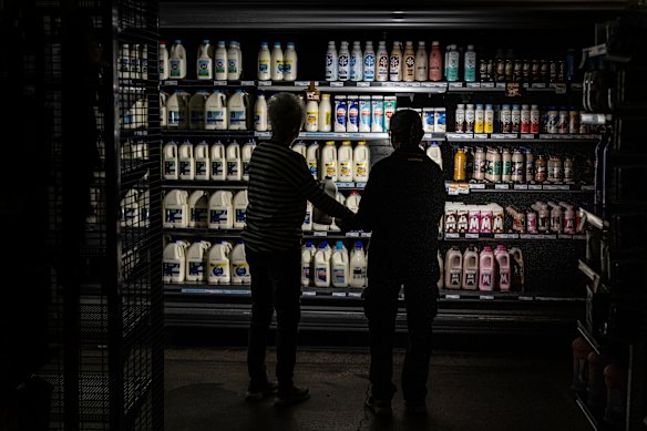 Locals in Yea were forced to shop using torchlight on Sunday morning as the power remained off after the bushfires.