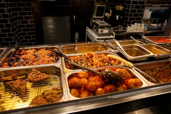 Nasi bungkus are scooped to order.
