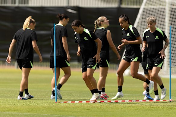 Sam Kerr and Mary Fowler warm up in Perth on Thursday.