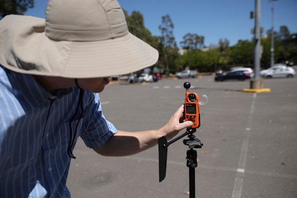 The heat stress tracker, pictured here in a Penrith carpark, recorded the air temperature as well as the “feels like” temperature.