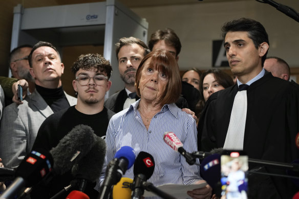 Pelicot speaks to the media outside court in December 2024.