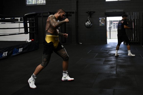 Tyson Pedro shadowboxes astatine  Bro Fit Gym.