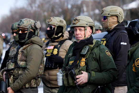 US Border Patrol Commander Gregory Bovino joins federal agents at the scene of the shooting.