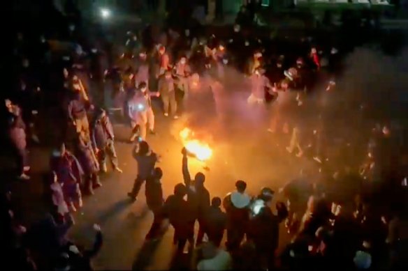 Protesters take to the streets in Tehran on January 9.