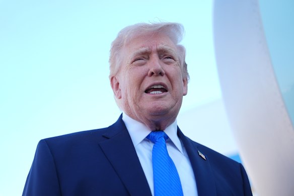 US President Donald Trump speaking to reporters on Monday after his Truth Social post.
