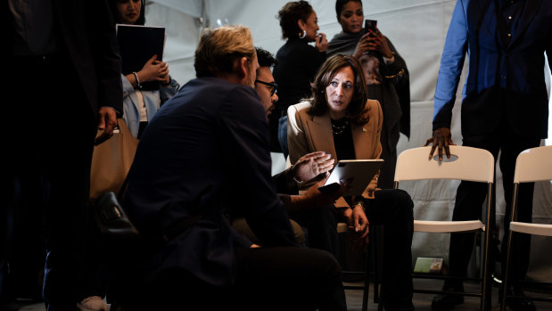 Harris speaking with her staff backstage at a campaign event in Clarkson, Georgia, last week. She still thinks like a prosecutor, many who have worked with her say.