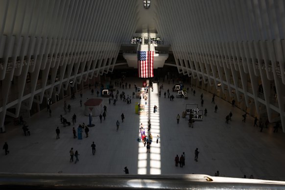 Sunlight shines across the Oculus floor, along the exact axis of what would be the North Tower, in lower Manhattan.