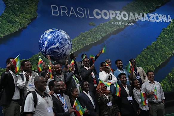 Delegates from Ethiopia, host of COP32, pose for a photo at the COP30.