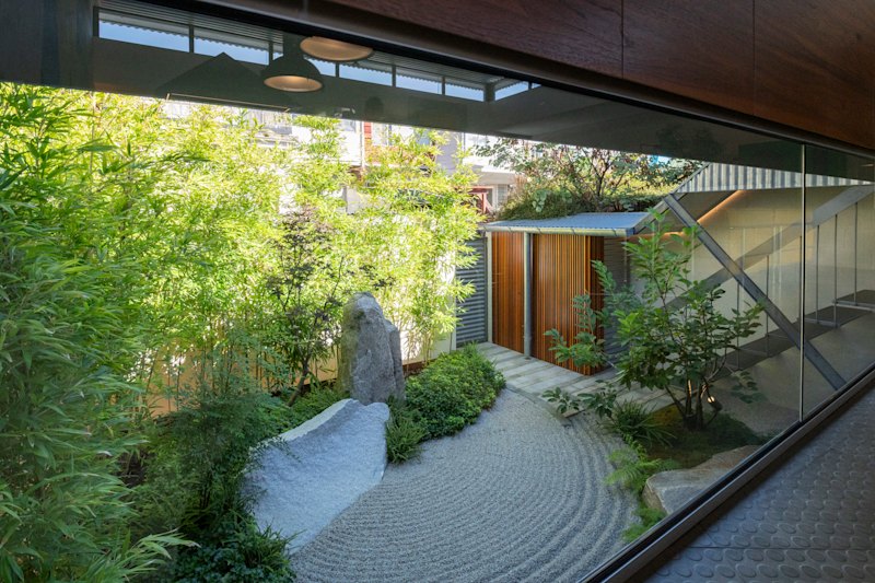 The rear Zen-style garden was designed by the eminent Japanese landscape architect and monk Shunmyo Masuno.
