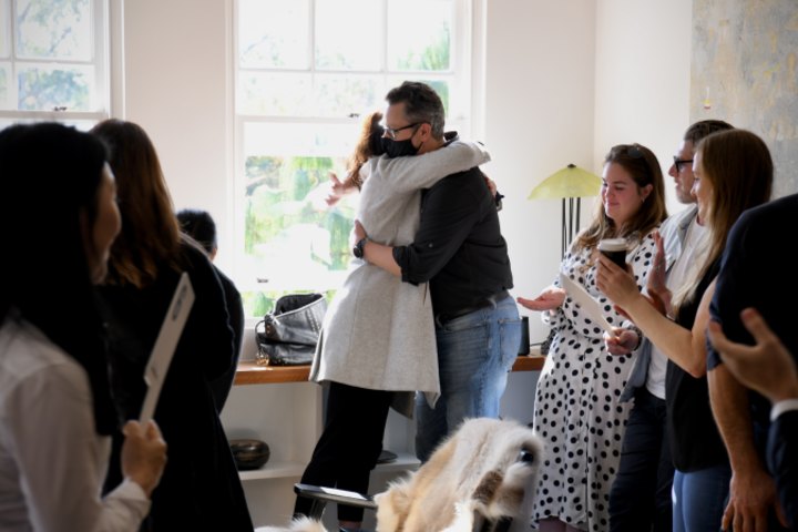 Buyer’s agent Brooke Flint of Flint Property congratulating her client, an expat who viewed the property for the first time this week.