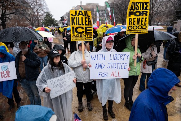 Demonstrators at Lafayette Park in front of the White House in Washington DC on Sunday AEDT.