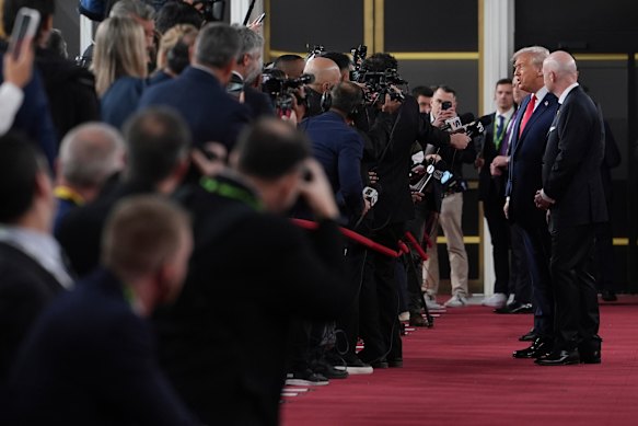 FIFA President Gianni Infantino and US President Donald Trump walk the red carpet together at the World Cup draw.