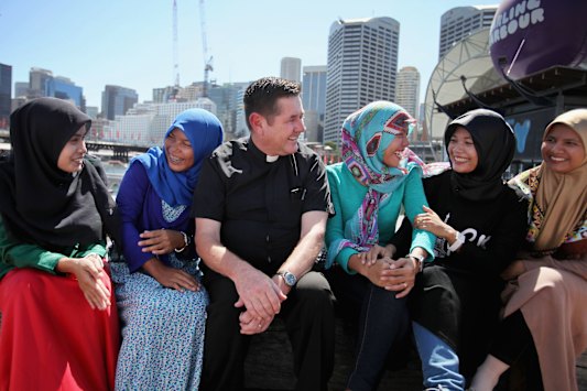 Chris Riley in 2015 with Indonesian students who found shelter with his Youth Off The Streets after being orphaned in the Boxing Day tsunami.