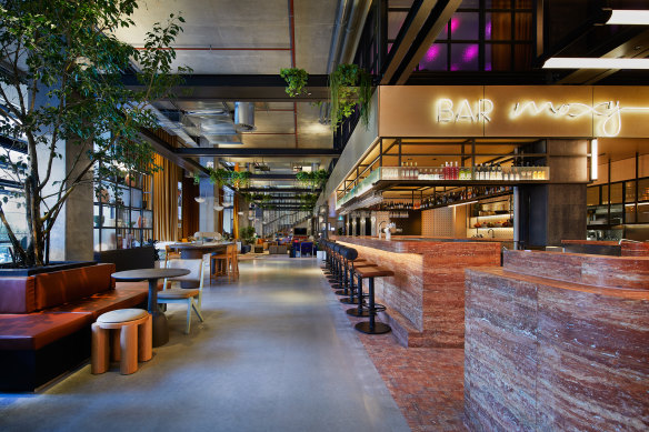Moxy Sydney Airport’s lobby – which houses a restaurant, bar and cafe – spills out into a couch-filled lounge.